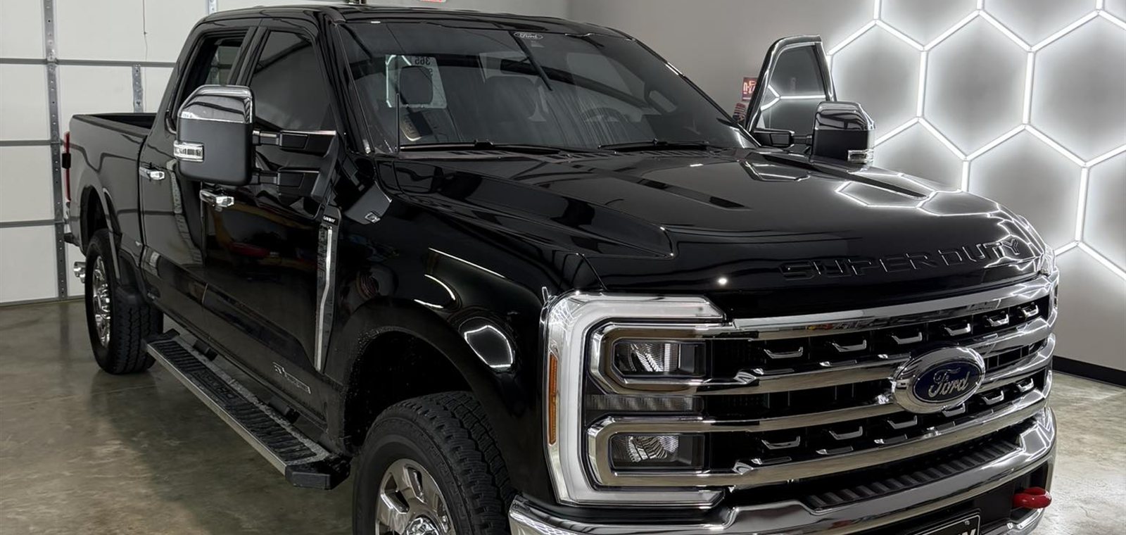 Black Ford F-250 Super Duty tinted at the Garrett Tinting shop in Bryant, AR